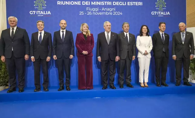 From left, Ukrainian Foreign Minister Andrii Sybiha, U.S. Secretary of State Antony Blinken, French Foreign Minister Jean-Noël Barrot, Canada's Foreign Minister Melanie Joly, Italian Foreign Minister Antonio Tajani, Japanese Foreign Minister Takeshi Iwaya, German Foreign Minister Annalena Baerbock, Britain's Foreign Office Political Director Christian Turner, and European Union foreign policy chief Josep Borrell pose for a family photo at the G7 of foreign Ministers in Fiuggi, some 70 kilometers south-east of Rome, Tuesday, Nov. 26, 2024. (AP Photo/Alessandra Tarantino, Pool)