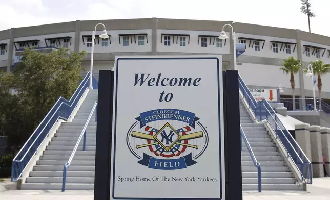 FILE - A sign welcoming baseball fans to George M. Steinbrenner Field, the spring training home of the New York Yankees is shown Tuesday, July 13, 2010, in Tampa, Fla. (AP Photo/Chris O'Meara, File)