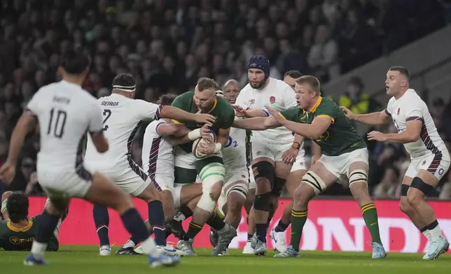 South Africa's RG Snyman tries to break through the England defence during the Autumn Nations series rugby union match between England and South Africa, at Twickenham, in London, Saturday, Nov. 16, 2024. (AP Photo/Kin Cheung)