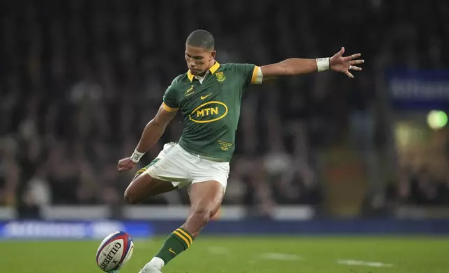 South Africa's Manie Libbok converts a try during the Autumn Nations series rugby union match between England and South Africa, at Twickenham, in London, Saturday, Nov. 16, 2024. (AP Photo/Kin Cheung)