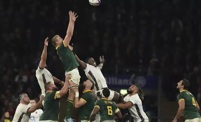 South Africa's Pieter-Steph du Toit leaps for the ball at a line out during the Autumn Nations series rugby union match between England and South Africa, at Twickenham, in London, Saturday, Nov. 16, 2024. (AP Photo/Ian Walton)