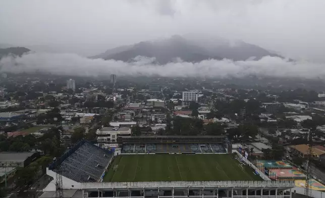 Storm clouds descend over the Francisco Morazan stadium during rains brought on by Tropical Storm Sara in San Pedro Sula, Honduras, Friday, Nov. 15, 2024. (AP Photo/Moises Castillo)