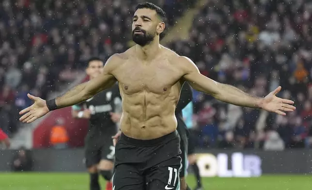 Liverpool's Mohamed Salah celebrates after scoring during the English Premier League soccer match between Southampton and Liverpool in Southampton, England, Sunday, Nov. 24, 2024. (AP Photo/Sean Ryan)