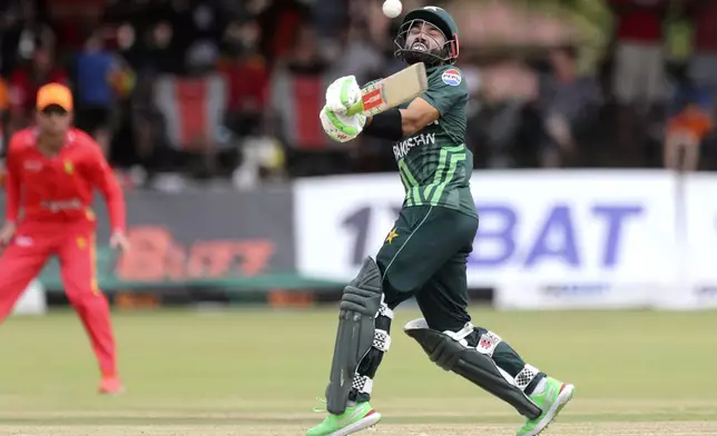 Pakistan's captain Mohammad Rizwan plays a ball on the first day of the ODI cricket match between Zimbabwe and Pakistan at Queens Sports Club in Bulawayo, Zimbabwe, Sunday, Nov. 24, 2024. (AP Photo/Wonder Mashura)