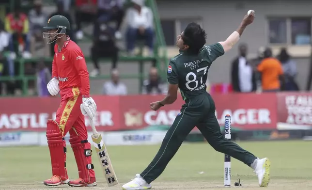 Pakistan bowler Mohammed Hasnain delivers a ball on the first day of the ODI cricket match between Zimbabwe and Pakistan at Queens Sports Club in Bulawayo, Zimbabwe, Sunday 24 Nov 2024 (AP Photo/Wonder Mashura)