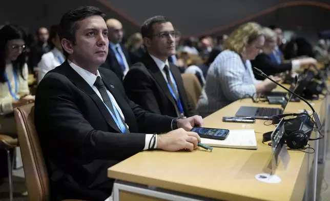 Yalchin Rafiyev, Azerbaijan's COP29 lead negotiator, attends a plenary session at the COP29 U.N. Climate Summit, Monday, Nov. 18, 2024, in Baku, Azerbaijan. (AP Photo/Rafiq Maqbool)