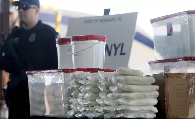 FILE - A display of fentanyl and meth that was seized by Customs and Border Protection officers at the Nogales Port of Entry, is shown during a media presentation in Nogales, Ariz. (Mamta Popat/Arizona Daily Star via AP, File)