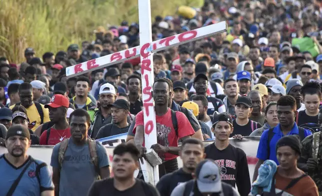 FILE - A migrant caravan departs from Tapachula, Mexico, Dec. 24, 2023, on their journey north through Mexico seeking entry into the United States. (AP Photo/Edgar H. Clemente, File)