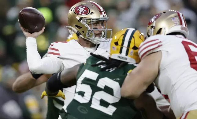 San Francisco 49ers quarterback Brandon Allen (17) looks to throw during the first half of an NFL football game against the Green Bay Packers on Sunday, Nov. 24, 2024 in Green Bay, Wis. (AP Photo/Matt Ludtke)