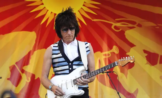 Rocker Jeff Beck performs at the Louisiana Jazz and Heritage Festival in New Orleans, Friday, April 29, 2011. (AP Photo/Gerald Herbert)