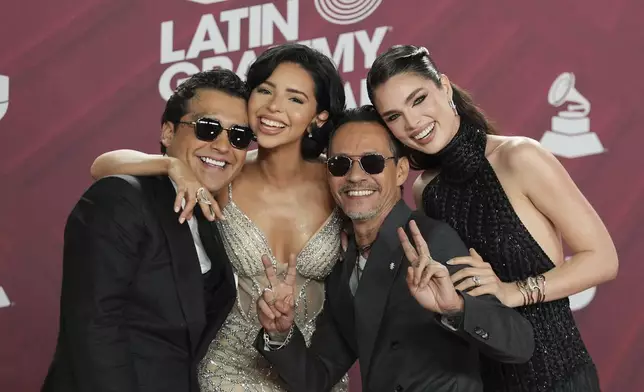 Christian Nodal, Angela Aguilar, Marc Anthony and Nadia Ferreira arrive at the 25th Latin Grammy Awards ceremony, Thursday, Nov. 14, 2024, in Miami. (AP Photo/Rebecca Blackwell)