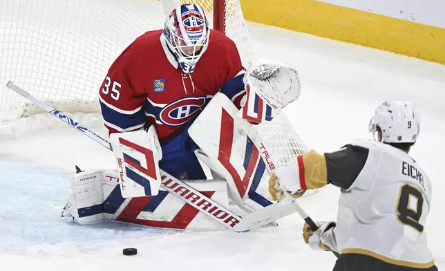 Vegas Golden Knights' Jack Eichel (9) takes a shot on Montreal Canadiens goaltender Sam Montembeault during the first period of an NHL hockey game in Montreal, Saturday, Nov. 23, 2024. (Graham Hughes/The Canadian Press via AP)