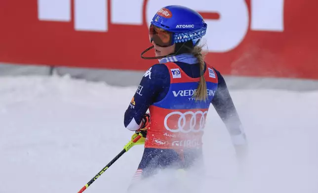 United States' Mikaela Shiffrin checks her time at the finish area of an alpine ski, women's World Cup slalom, in Gurgl, Austria, Saturday, Nov. 23, 2024. (AP Photo/Giovanni Maria Pizzato)