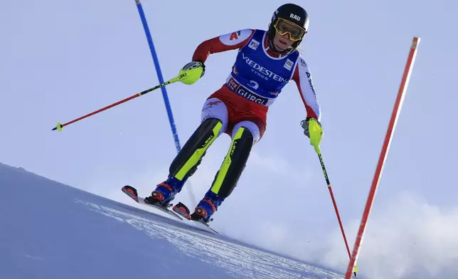 Austria's Katharina Liensberger speeds down the course during an alpine ski, women's World Cup slalom, in Gurgl, Austria, Saturday, Nov. 23, 2024. (AP Photo/Giovanni Maria Pizzato)