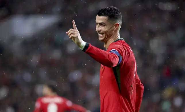 Portugal's Cristiano Ronaldo gestures during the UEFA Nations League soccer match between Portugal and Poland at the Dragao stadium in Porto, Portugal, Friday, Nov. 15, 2024. (AP Photo/Luis Vieira)