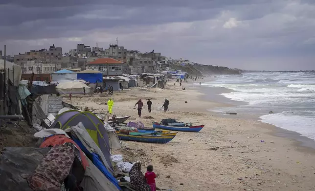 Tents occupied by displaced Palestinians are seen at the beach in Deir al-Balah, Gaza Strip, Tuesday Nov. 26, 2024. (AP Photo/Abdel Kareem Hana)