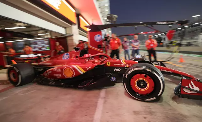 Ferrari driver Charles Leclerc of Monaco leaves the pit during practice at the Lusail International Circuit in Lusail, Qatar, ahead of the Qatar Formula One Grand Prix, Friday, Nov. 29, 2024. (AP Photo/Darko Bandic)