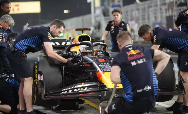 Red Bull driver Max Verstappen of the Netherlands makes a pit stop during practice at the Lusail International Circuit in Lusail, Qatar, ahead of the Qatar Formula One Grand Prix, Friday, Nov. 29, 2024. (AP Photo/Darko Bandic)