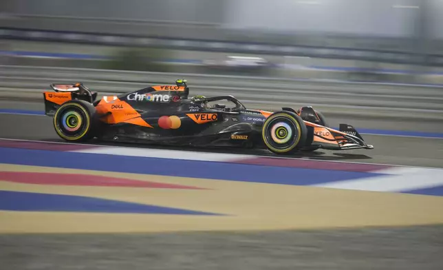 McLaren driver Lando Norris of Britain in action during practice at the Lusail International Circit in Lusail, Qatar, ahead of the Qatar Formula One Grand Prix, Friday, Nov. 29, 2024. (AP Photo/Altaf Qadri)