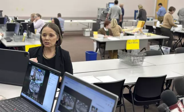 Maine's Secretary of State Shenna Bellows addresses a livestream as election workers scan ballots, Tuesday, Nov. 12, 2024, in Augusta Maine. (AP Photo/David Sharp)