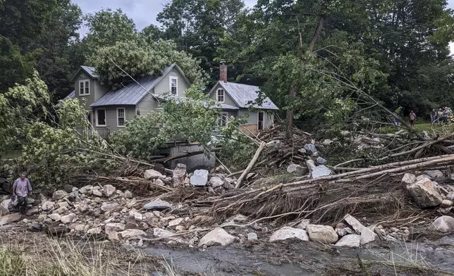 The flood-damaged property of John and Jenny Mackenzie is shown on July 11, 2024 in Peacham, Vt. (Courtesy of Susan Dunklee via AP)