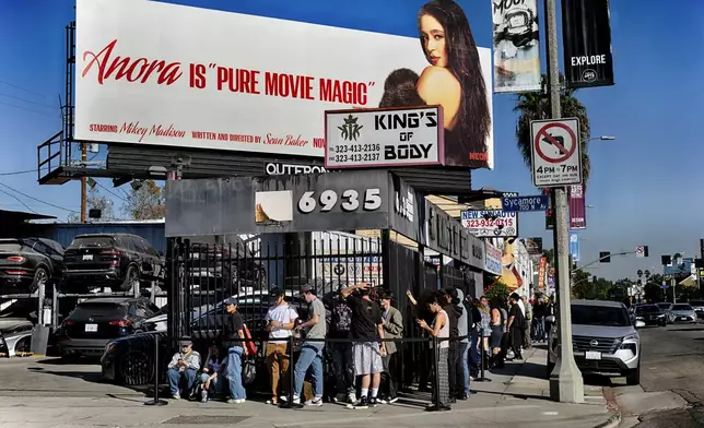 Anora movie fans line up at a merchandise Pop-Up event for recently released film Anora on Saturday, Nov. 9, 2024 in Los Angeles. (AP Photo/Richard Vogel)