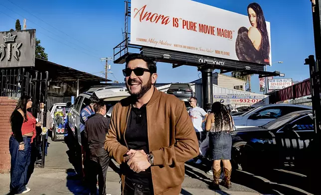 Actor Vache Tovmasyan greets fans during a merchandise Pop-Up event for the movie Anora on Saturday, Nov. 9, 2024 in Los Angeles. (AP Photo/Richard Vogel)