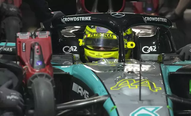 Mercedes driver Lewis Hamilton, of Britain, sits in is carvduring qualifications for the Formula One U.S. Grand Prix auto race, Friday, Nov. 22, 2024, in Las Vegas. (AP Photo/John Locher)