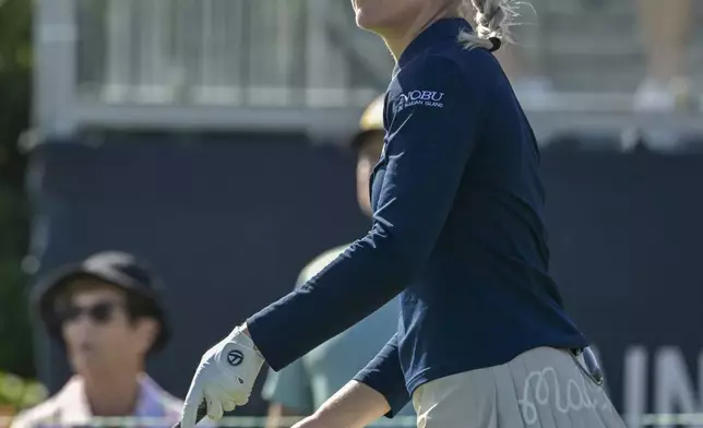 Charley Hull of England watches her tee shot on the first hole during the first round of The Annika golf tournament at Pelican Golf Club, Thursday, Nov. 14, 2024, in Belleair, Fla. (AP Photo/Steve Nesius)