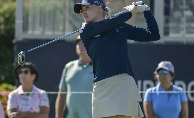 Charley Hull of England hits her tee shot on the first hole during the first round of the The Annika golf tournament at Pelican Golf Club, Thursday, Nov. 14, 2024, in Belleair, Fla. (AP Photo/Steve Nesius)