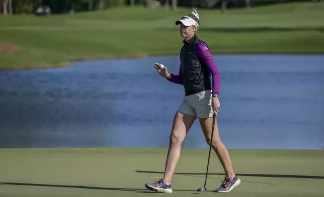 Nelly Korda walks across the ninth green during the first round of the LPGA Annika golf tournament at Pelican Golf Club, Thursday, Nov. 14, 2024, in Belleair, Fla. (AP Photo/Steve Nesius)