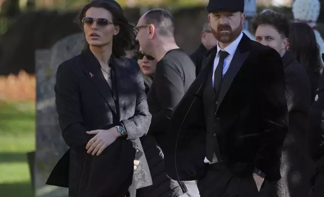 Damian Hurley, left, arrives the funeral service of One Direction singer Liam Payne at St Mary's Church in Amersham, England, Wednesday, Nov. 20, 2024. (Jonathan Brady/PA via AP)