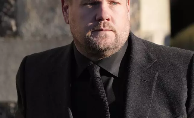 James Corden walks after the funeral service of One Direction singer Liam Payne at St Mary's Church in Amersham, England, Wednesday, Nov. 20, 2024. (Andrew Matthews/PA via AP)