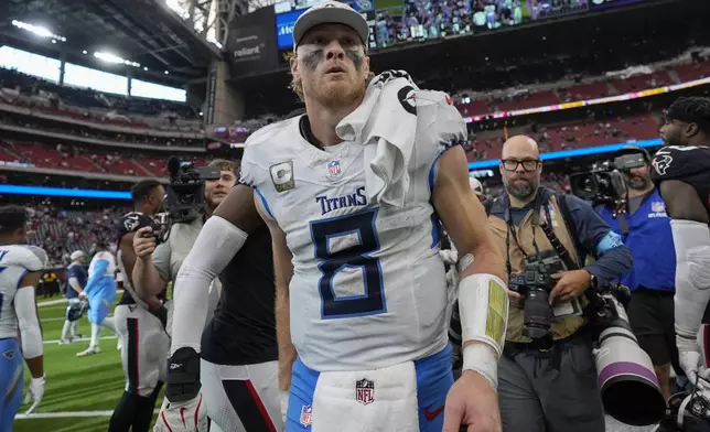 Tennessee Titans quarterback Will Levis (8) leaves the field after the team's win against the Houston Texans in an NFL football game Sunday, Nov. 24, 2024, in Houston. (AP Photo/Ashley Landis)