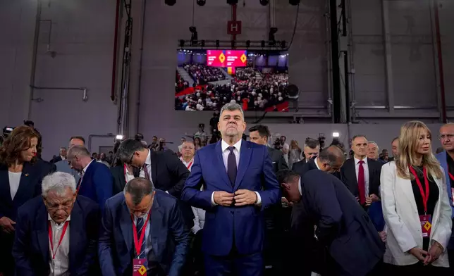 Romanian Prime Minister Marcel Ciolacu attends the congress of the Social Democratic Party or PSD, which nominated him as the party's candidate in the upcoming Nov. 24 presidential elections in Bucharest, Romania, Saturday, Aug. 24, 2024. (AP Photo/Andreea Alexandru)