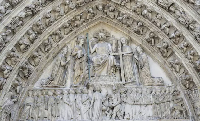 A view of part of a bas-relief outside Notre-Dame de Paris cathedral, Friday, Nov. 29, 2024 in Paris. (Stephane de Sakutin/Pool via AP)