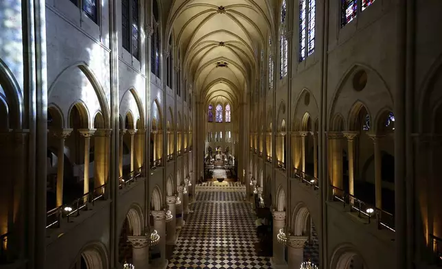 The nave of the Notre-Dame de Paris cathedral is seen while French President Emmanuel Macron visited the restored interiors of the monument, Friday, Nov. 29, 2024 in Paris. (Sarah Meyssonnier/Pool via AP)