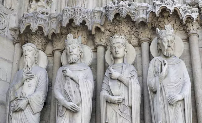 A view of part of a bas-relief outside Notre-Dame de Paris cathedral, Friday, Nov. 29, 2024 in Paris. (Sarah Meyssonnier/Pool via AP)