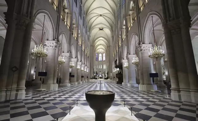 View of the Notre-Dame de Paris cathedral as French President Emmanuel Macron visits the restored cathedral, Friday, Nov. 29, 2024 in Paris (Christophe Petit Tesson, Pool via AP)