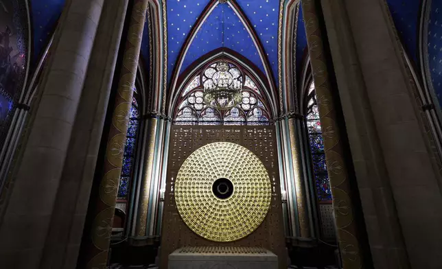 The Crown of thorns inside the reliquary of the Crown of Thorns designed by French Artist Sylvain Dubuisson is seen in of Notre-Dame de Paris cathedral while French President Emmanuel Macron visits the restored interiors of the monument, Friday Nov. 29, 2024, in Paris. (Stephane de Sakutin, Pool via AP)