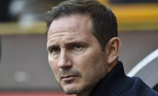 FILE - Chelsea's caretaker manager Frank Lampard looks out from the bench before the English Premier League soccer match between Wolverhampton Wanderers and Chelsea, at the Molineux Stadium, in Wolverhampton, England, Saturday, April 8, 2023. (AP Photo/Rui Vieira, File)