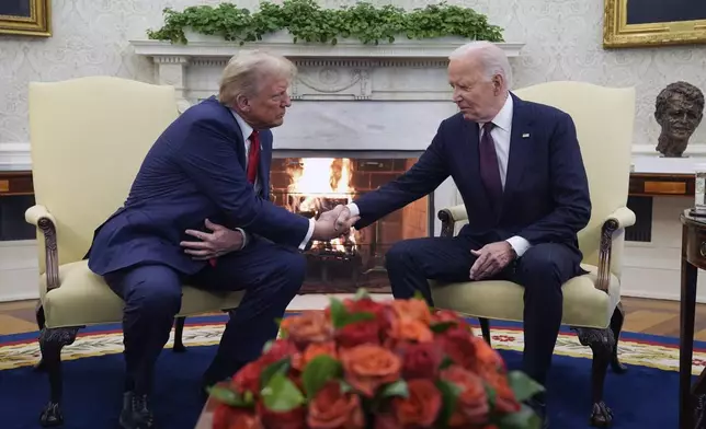 President Joe Biden meets with President-elect Donald Trump in the Oval Office of the White House, Wednesday, Nov. 13, 2024, in Washington. (AP Photo/Evan Vucci)