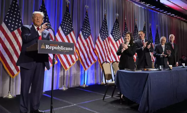 President-elect Donald Trump speaks as he arrives for a meeting with the House GOP conference, Wednesday, Nov. 13, 2024, in Washington. From left are Rep. Elise Stefanik, R-N.Y., Rep. Richard Hudson, R-N.C., Rep. Steve Scalise, R-La., and Rep. Tom Emmer, R-Minn. AP Photo/Alex Brandon)