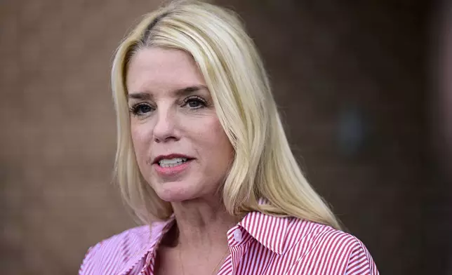 FILE - Pam Bondi, former Florida Attorney General, speaks to reporters outside an election integrity volunteer training, June 18, 2024, in Newtown, Pa. (AP Photo/Derik Hamilton, File)