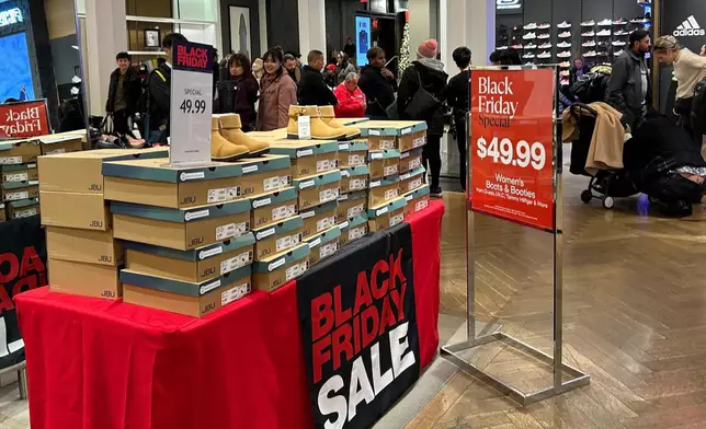 Items on sale for Black Friday are displayed at Macy's department store on Sunday, Nov. 24, 2024, in New York. (AP Photo/Anne D'Innocenzio)