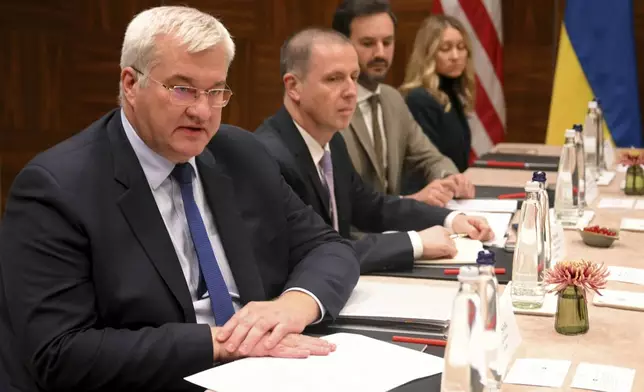 Ukraine's Foreign Minister Andrii Sybiha, left, waits for the start of a meeting with United States Secretary of State Antony Blinken in Brussels, Wednesday, Nov. 13, 2024. (Nicolas Tucat, Pool Photo via AP)