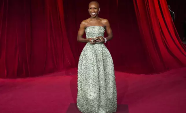 FILE - Cynthia Erivo arrives at the fourth annual Academy Museum Gala on Saturday, Oct. 19, 2024, at the Academy Museum of Motion Pictures in Los Angeles. In “Wicked,” Elphaba and Glinda travel from Shiz University to the Emerald City on a glistening green train to meet the wizard. In real life, Cynthia Erivo and Ariana Grande have traveled much farther and wider and longer and on airplanes to promote their hotly anticipated film. (Photo by Jordan Strauss/Invision/AP, File)