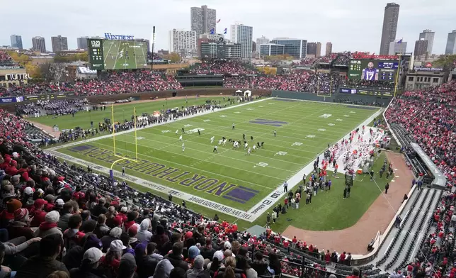 Ohio State and Northwestern square off during the first half of an NCAA college football game at Wrigley Field on Saturday, Nov. 16, 2024, in Chicago. Ohio State won 31-7. (AP Photo/Charles Rex Arbogast)