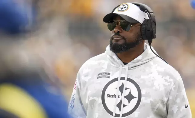 Pittsburgh Steelers head coach Mike Tomlin looks on during the first half of an NFL football game against the Baltimore Ravens, Sunday, Nov. 17, 2024, in Pittsburgh. (AP Photo/Gene J. Puskar)