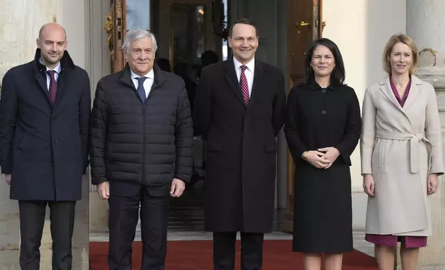 From left, France's Minister for Europe and Foreign Affairs Jean-Noel Barrot, Italy's Foreign Minister Antonio Tajani, Poland's Foreign Minister Radoslaw Sikorski, Germany's Foreign Minister Annalena Baerbock and Estonia's EU Commissioner-Designate Kaja Kallas, pose for a photo on the occasion of a European foreign ministers meeting, in Warsaw, Tuesday, Nov. 19, 2024. (AP Photo/Czarek Sokolowski)